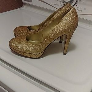 Gold high heels